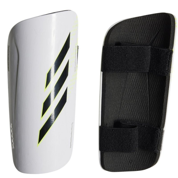 Futbalový chránič Adidas X SG TRN, čierno-biely Futbalový chránič Adidas X SG TRN, čierno-biely