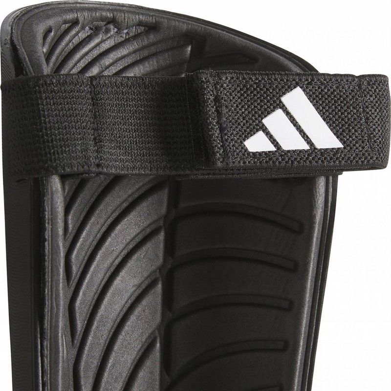 Futbalový chránič Adidas Tiro SG TRN, čierno-zlatý