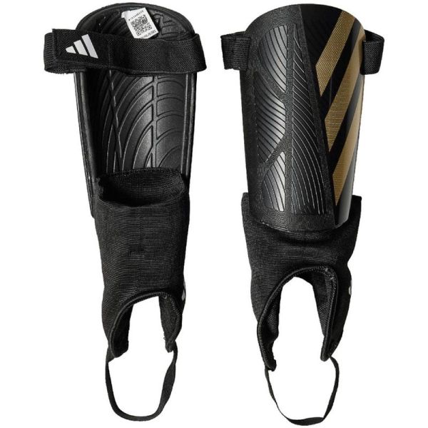 Futbalový chránič Adidas Tiro SG Match, čierno-zlatý Futbalový chránič Adidas Tiro SG Match, čierno-zlatý
